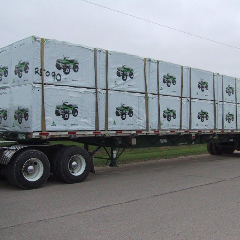 Container with ATVs covered